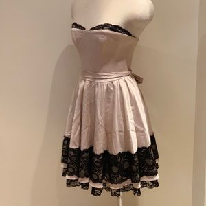 Strapless pink and black lace party dress